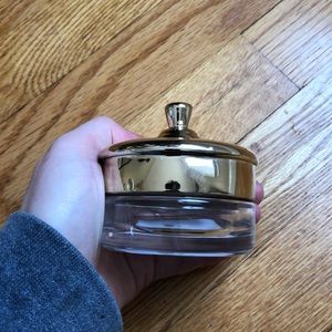 little glass jar with gold top